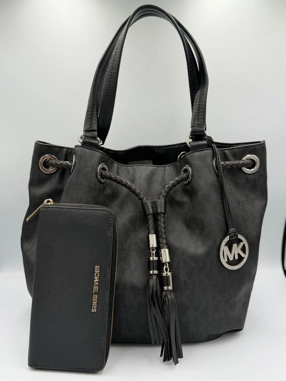 Michael Kors Black Shoulder Drawstring Tote with Tassel  and Wallet (pre owned)
